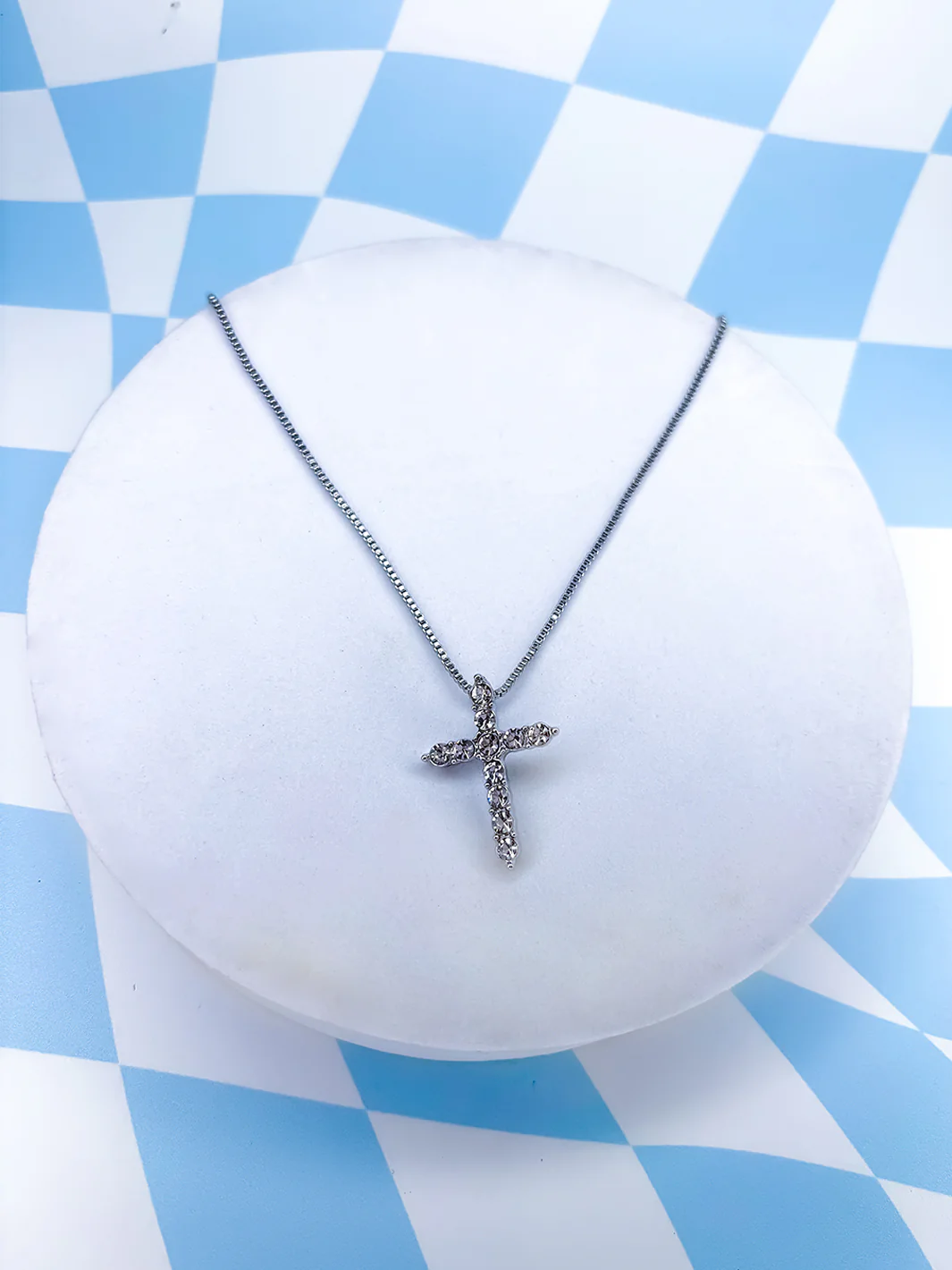 CHARMED CROSS NECKLACE